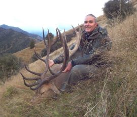 Happy client with long tyned trophy stag