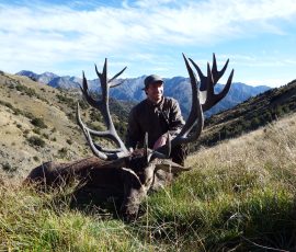Philip with gold medal red stag